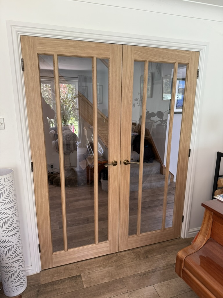 Oak French doors fitted between two rooms